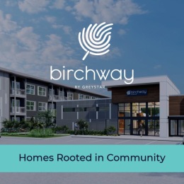 the entrance with a parking lot 